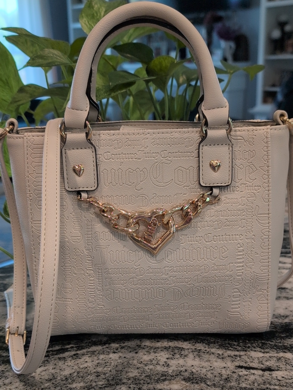 Juicy Couture Cream Embossed Satchel with Gold Heart Chain Accent